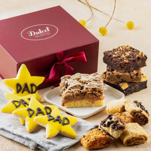 Gourmet cookie gift basket with maroon box, ribbon, and decorated Dad star cookies on a plate