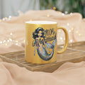Gold metallic mug with mermaid graphic and handle, “100% Mermaid” on front
