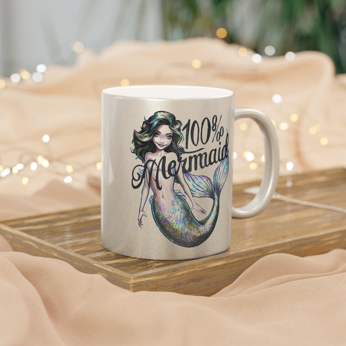 Silver metallic mug with mermaid graphic and handle, “100% Mermaid” on front