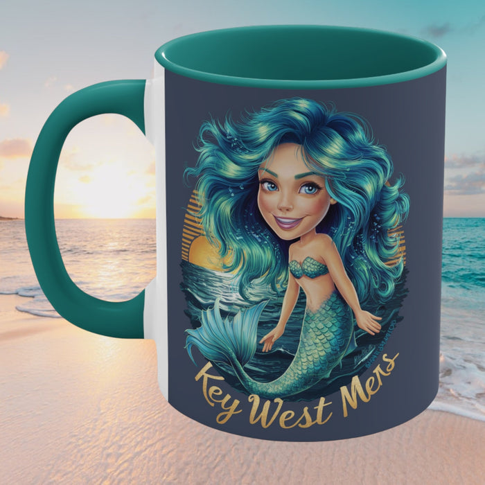 Teal and white accent mug with mermaid girl illustration on front, left curved handle