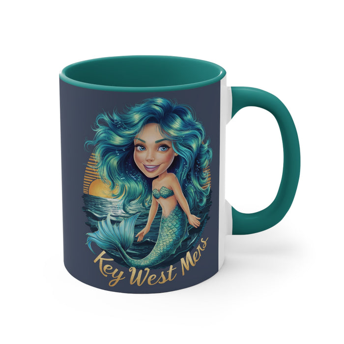 Teal and white accent mug with mermaid girl illustration on front, right side handle