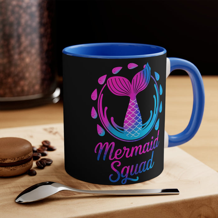 Black 11oz accent mug with Mermaid Squad logo in pink and blue, blue handle