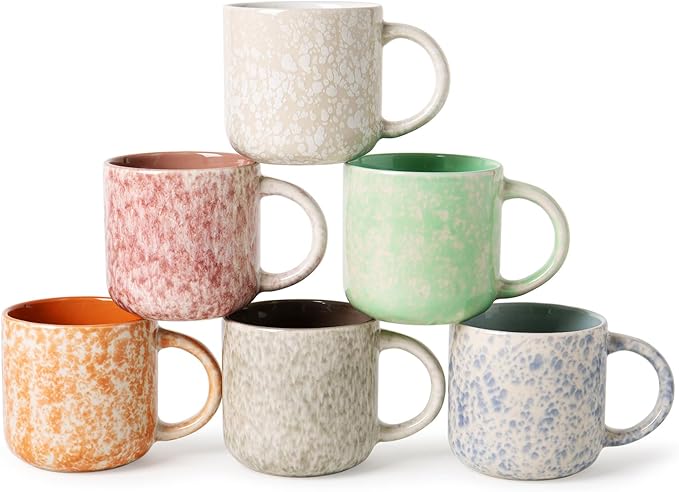 Set of six speckled ceramic coffee mugs with curved handles, assorted pastel colors