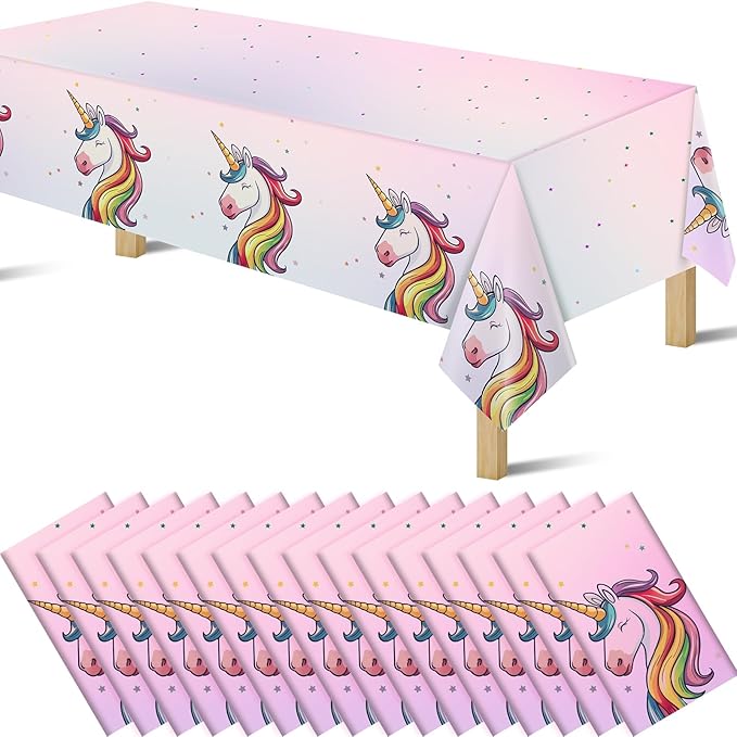 Unicorn plastic tablecloth with pink background, rainbow-maned unicorns and star dots