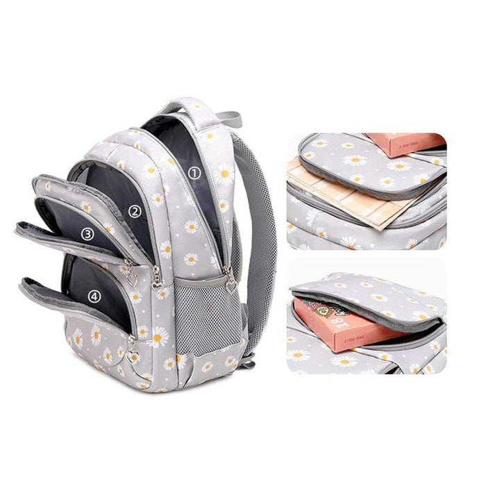 Light gray daisy school backpack set showing side storage pockets and zip pouch