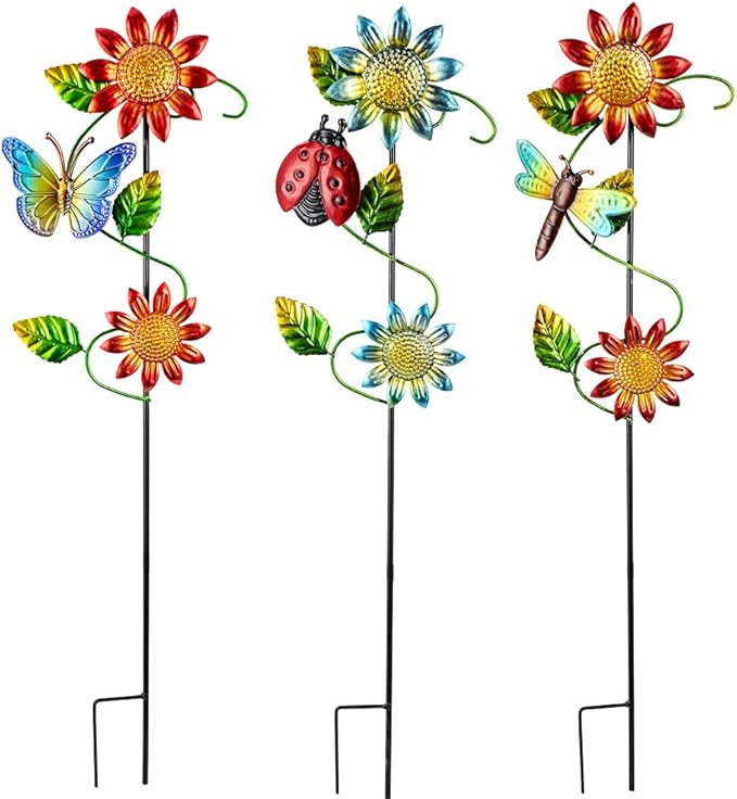 Three metal garden stakes with red and blue sunflowers, butterflies, ladybug, and dragonfly