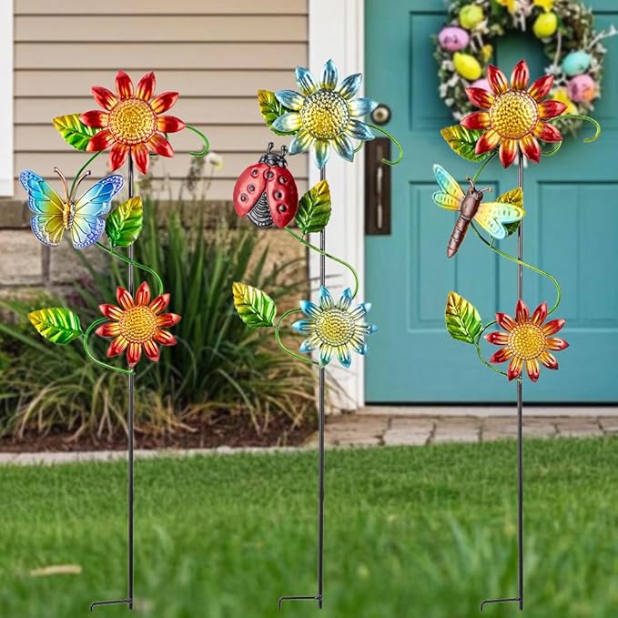 Three metal garden stakes with multi-color sunflowers, butterflies, ladybug, and dragonfly