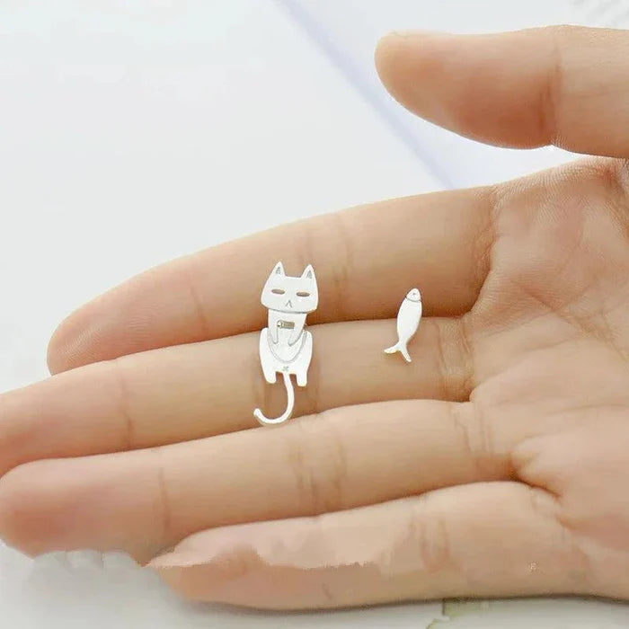 925 sterling silver cat-and-fish charm earrings, cat face and fish tail shown
