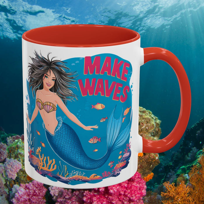 Red-accent coffee mug with mermaid "MAKE WAVES" graphic on the front and side handle.