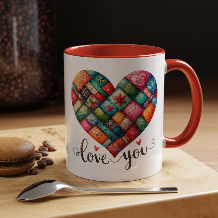 Accent coffee mug with 'love you' multicolor heart patch, red interior and side handle