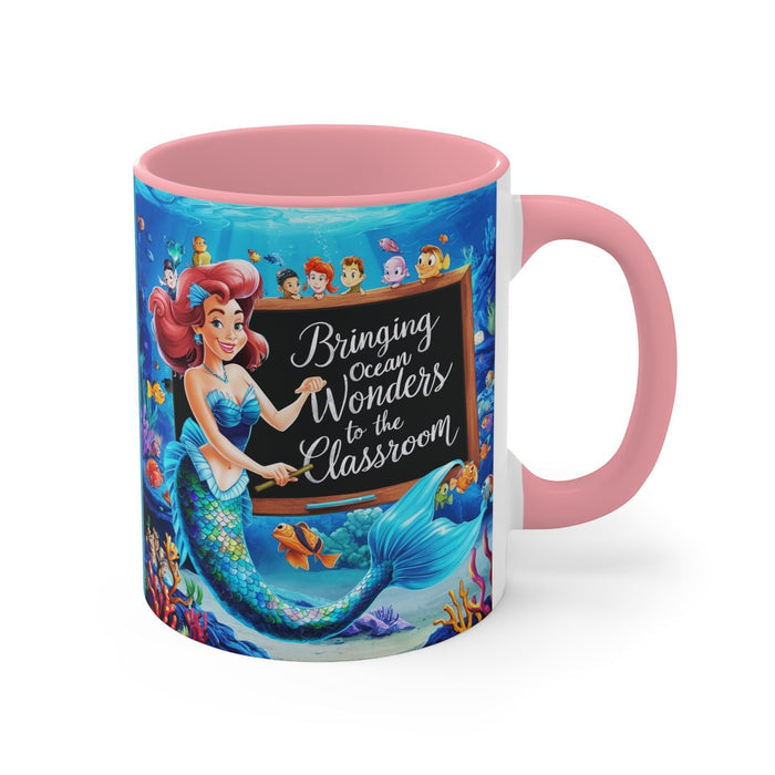Pink ceramic accent mug with mermaid and coral reef print, pink handle