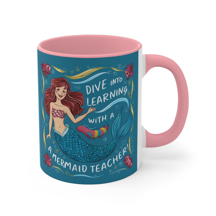 Pink accent mug with teal mermaid artwork and "Dive into Learning" text