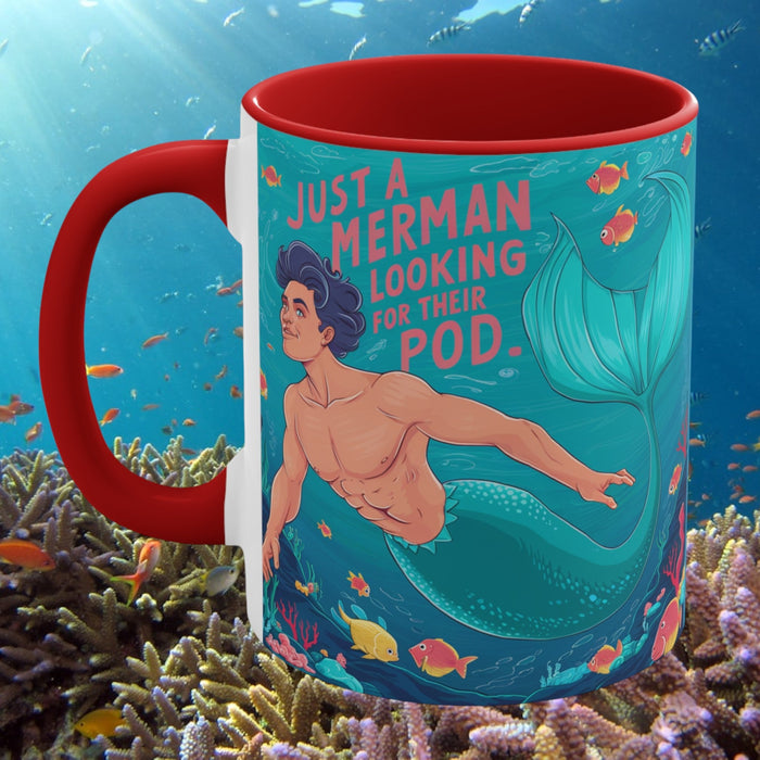 Red accent mug with teal mermaid scene and colorful fish graphic on the front.
