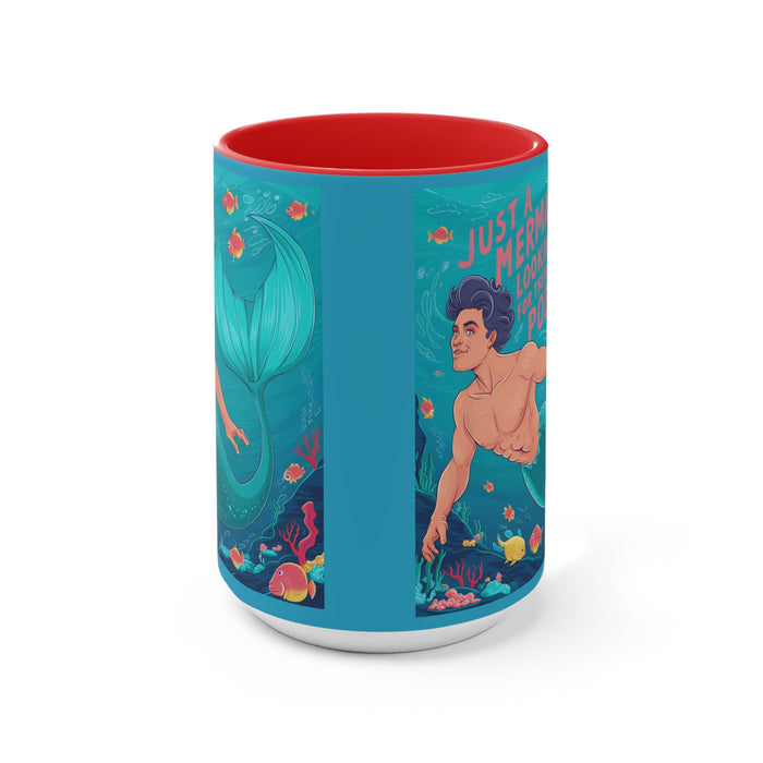 Blue accent mug with red interior, mermaid scene and colorful fish graphic on the side.