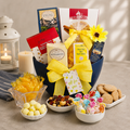 All Smiles gift basket with blue hamper, yellow bow, and assorted candy and snacks