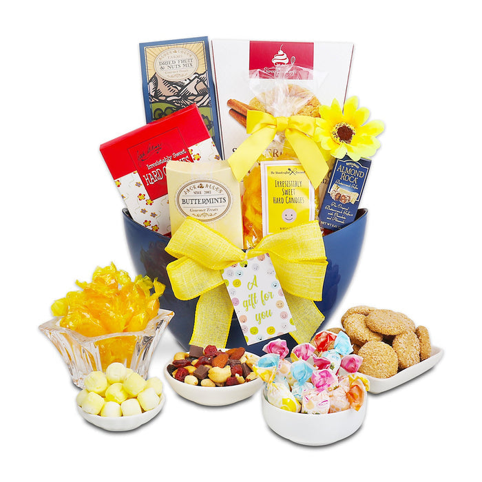 All Smiles gift basket with blue hamper, yellow bow, and three front candy bowls