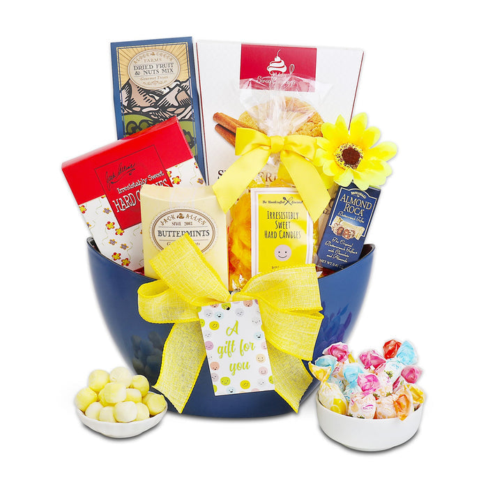 All Smiles gift basket with blue hamper, yellow bow, and two small candy bowls