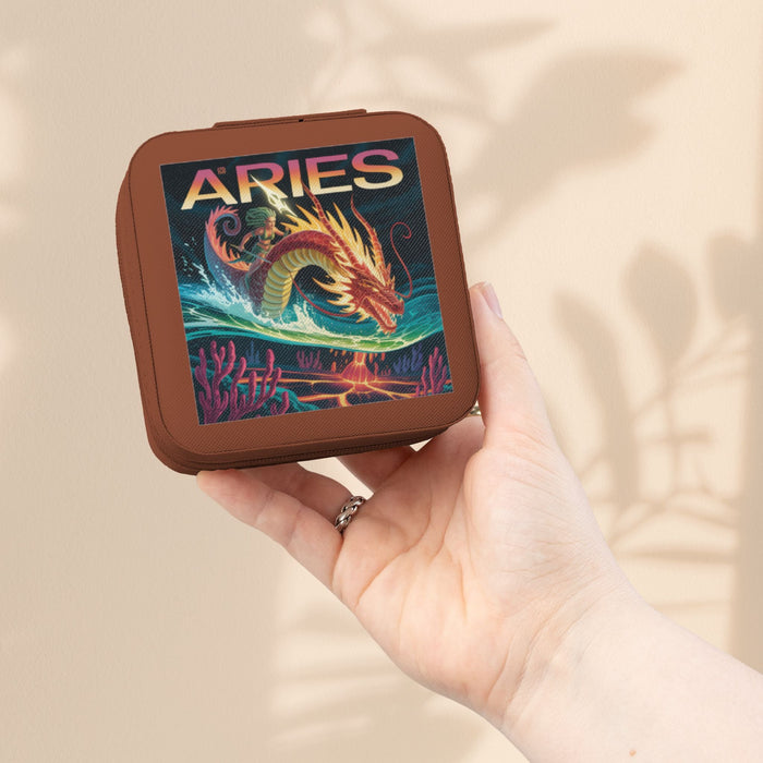 Brown zodiac jewelry travel case with ARIES front print, held in hand, zip-top organizer