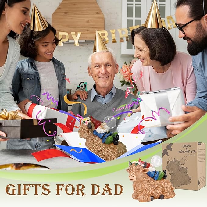 Solar highland cow gnome statue and gift box at birthday celebration