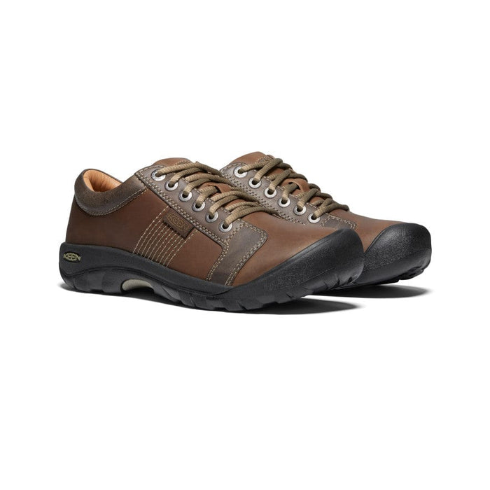 Keen Austin casual shoes in brown leather with durable black rubber outsoles and lace-up design, angled side view.