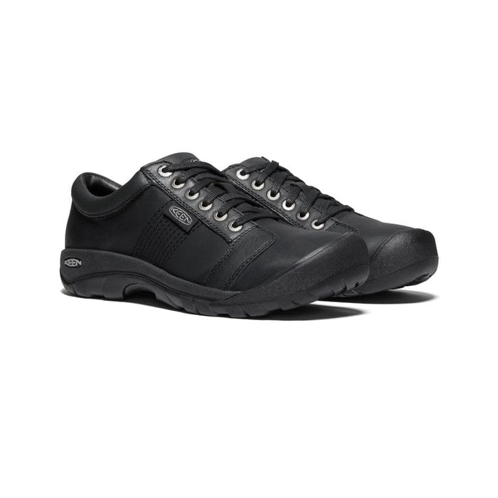 Keen Austin casual shoes in black leather with lace-up closure and durable rubber outsole, angled side view.