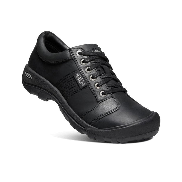 Keen Austin casual shoes in black leather with lace-up design and durable rubber sole, side angle view.