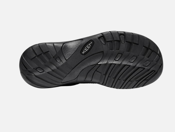 Keen Austin shoe outsole in black rubber featuring textured tread pattern and embossed brand logo, sole/bottom view.