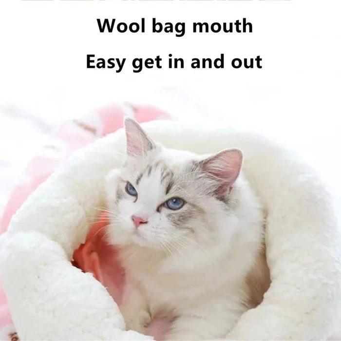 Closed cat sleeping bag with soft plush tunnel; white cat tucked inside