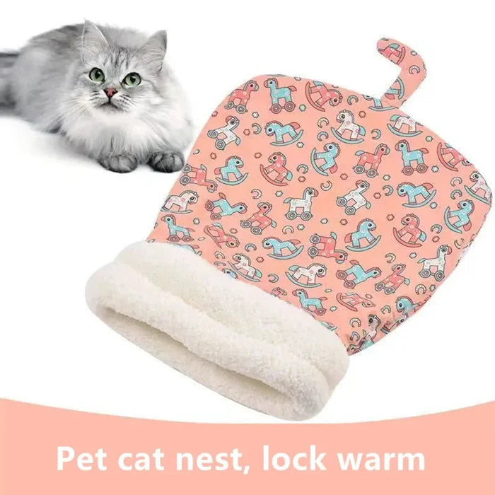 Closed cat sleeping bag with plush rim and pink robot-print cover, folded