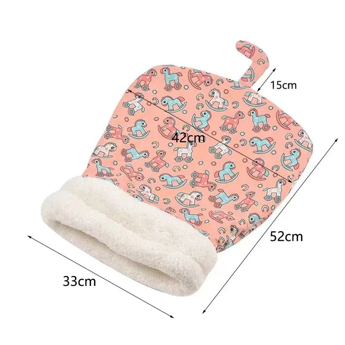Closed cat sleeping bag with plush rim and pink robot-print cover, laid flat