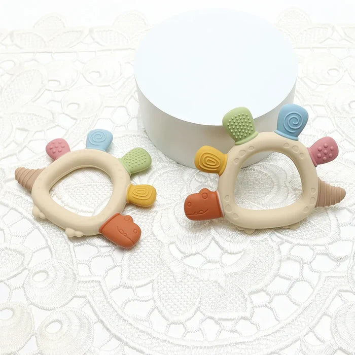 Baby Dinosaur Silicone Teether – BPA-Free Soothing Toy