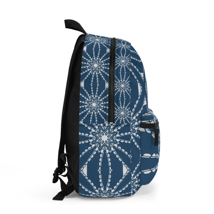 Blue patterned backpack with padded straps, front side pocket, and black trim