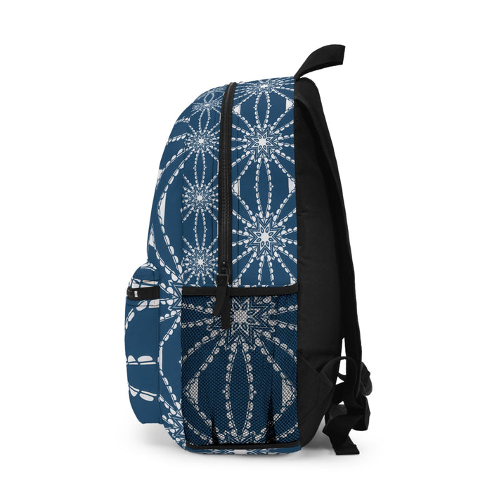Blue compass-style printed backpack with front pocket, black shoulder straps, and side tassel