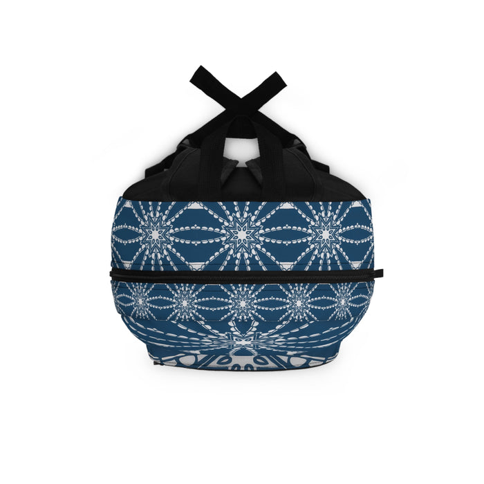 Blue patterned backpack top view with black drawstring tie and front zipper