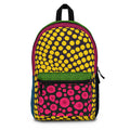 Colorful mini backpack with yellow dot pattern, green top, pink front pocket, black straps