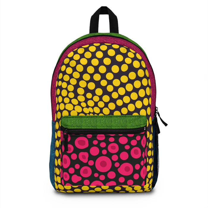 Colorful mini backpack with yellow dot pattern, green top, pink front pocket, black straps