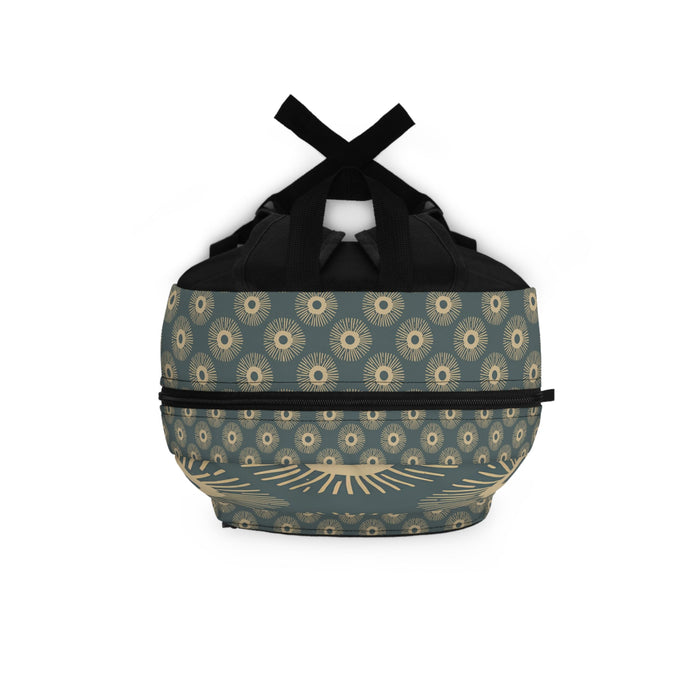 Patterned teal backpack with top handle and cinched closure, front pocket panel