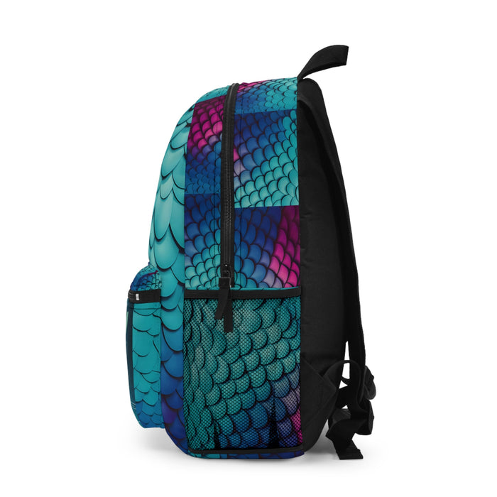 Mermaid-scale backpack back view in teal and blue with black shoulder straps and small pocket.