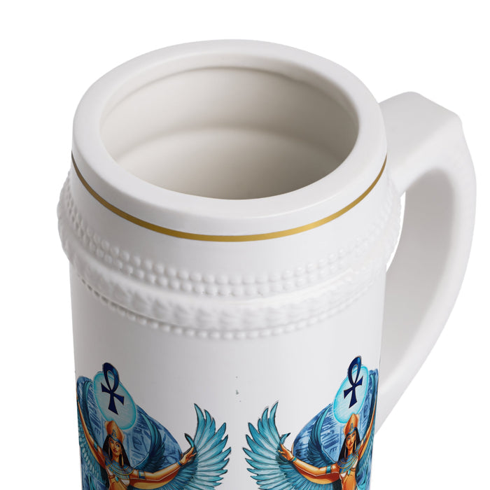 White beer stein mug with handle, blue angel-and-wing print, and gold rim