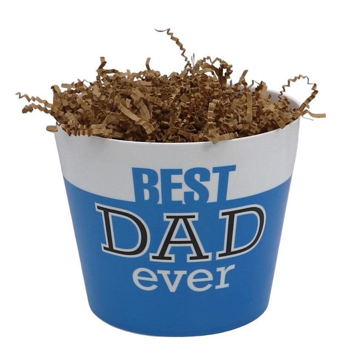Snack gift basket with blue-and-white liner and brown shredded filler