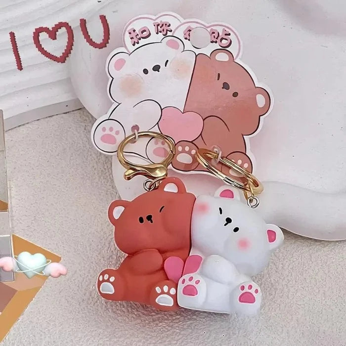 Cute magnetic bear keychain pair, brown and white, with gold key rings