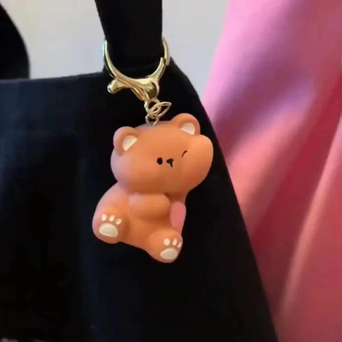 Single brown bear magnetic keychain with gold key ring clasp
