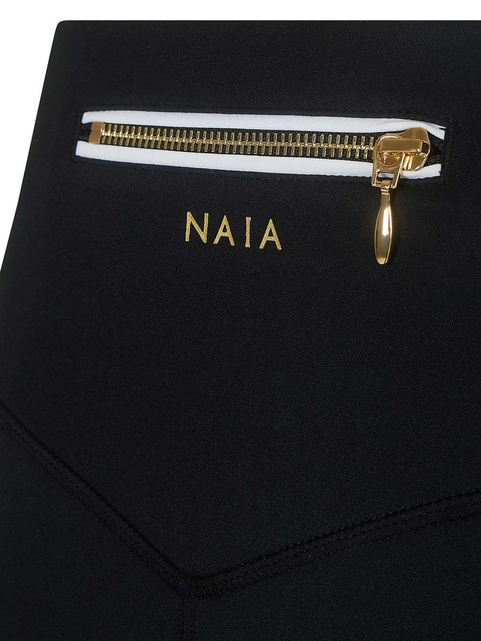 Billie  legging in black with white piping detAil from NAIA Active active wear collection