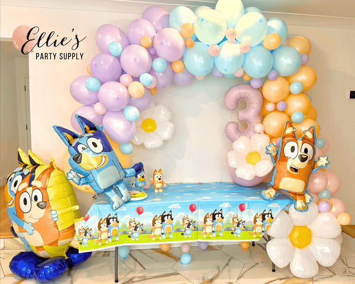 Bluey and Bingo balloon garland arch with number 3 balloon and pastel balloons