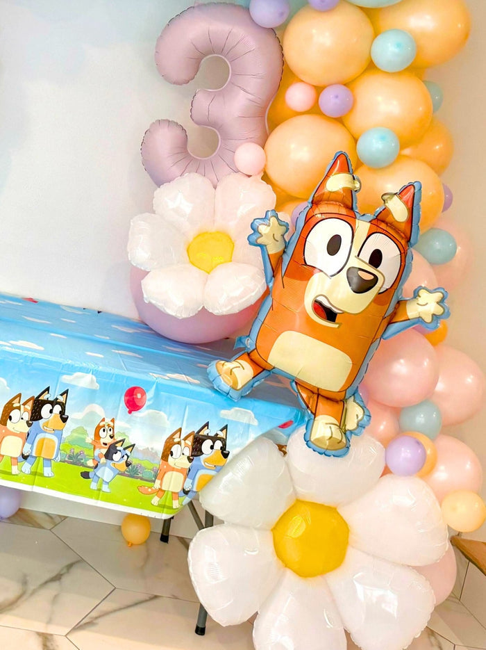 Bingo character balloon on number 3 balloon garland arch with pastel balloons