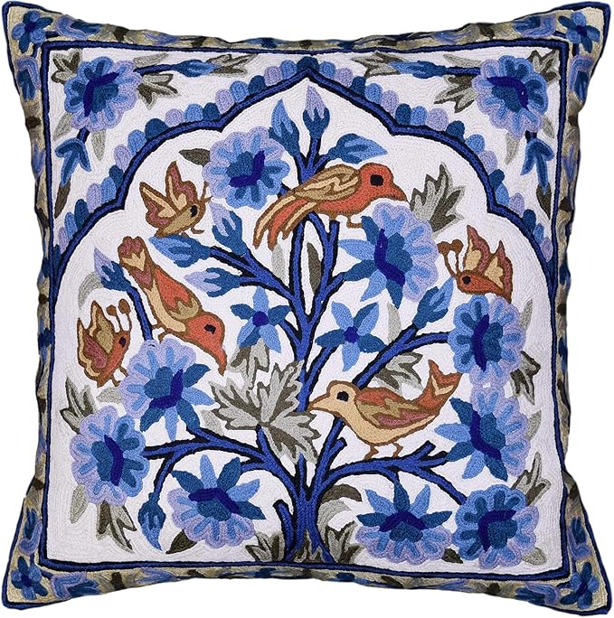 Blue floral tree of life pillow cover with embroidered birds and dark blue border.