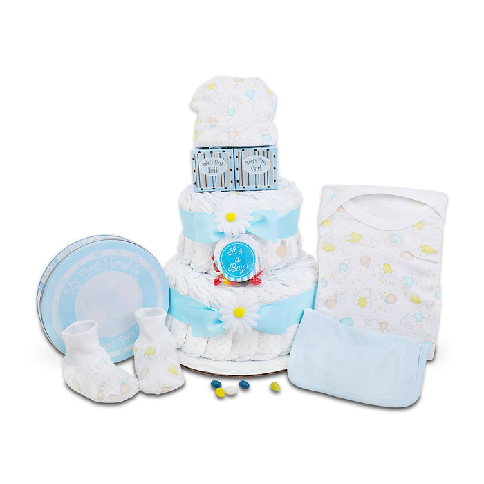 Blue two-tier diaper cake with socks, round baby badge, and baby bib