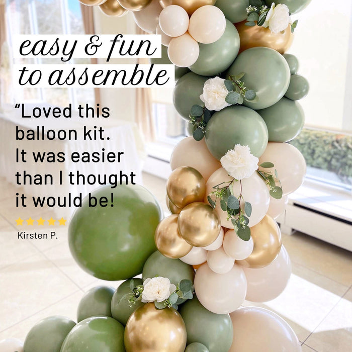 Balloon garland cluster with sage green, cream and gold balloons and small white flowers
