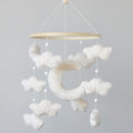 Boho crib moon mobile with white plush clouds and dangling bead strings