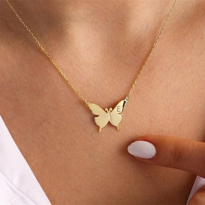 Gold-tone butterfly initial letter necklace with E charm and delicate chain